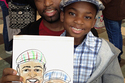 Man and his son display picture at a mall event