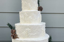 Winter wonderland wedding cake, buttercream mountains, trees, snow